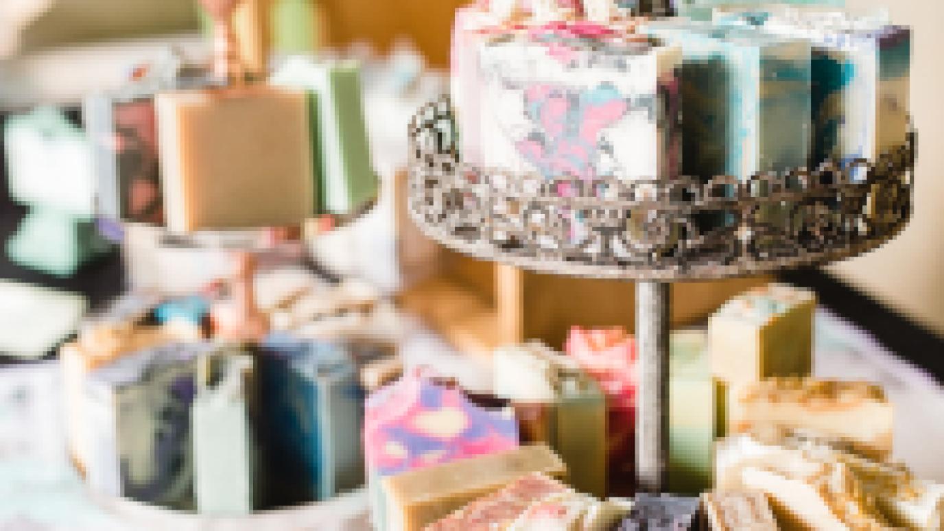 three artisan soaps on display on a table