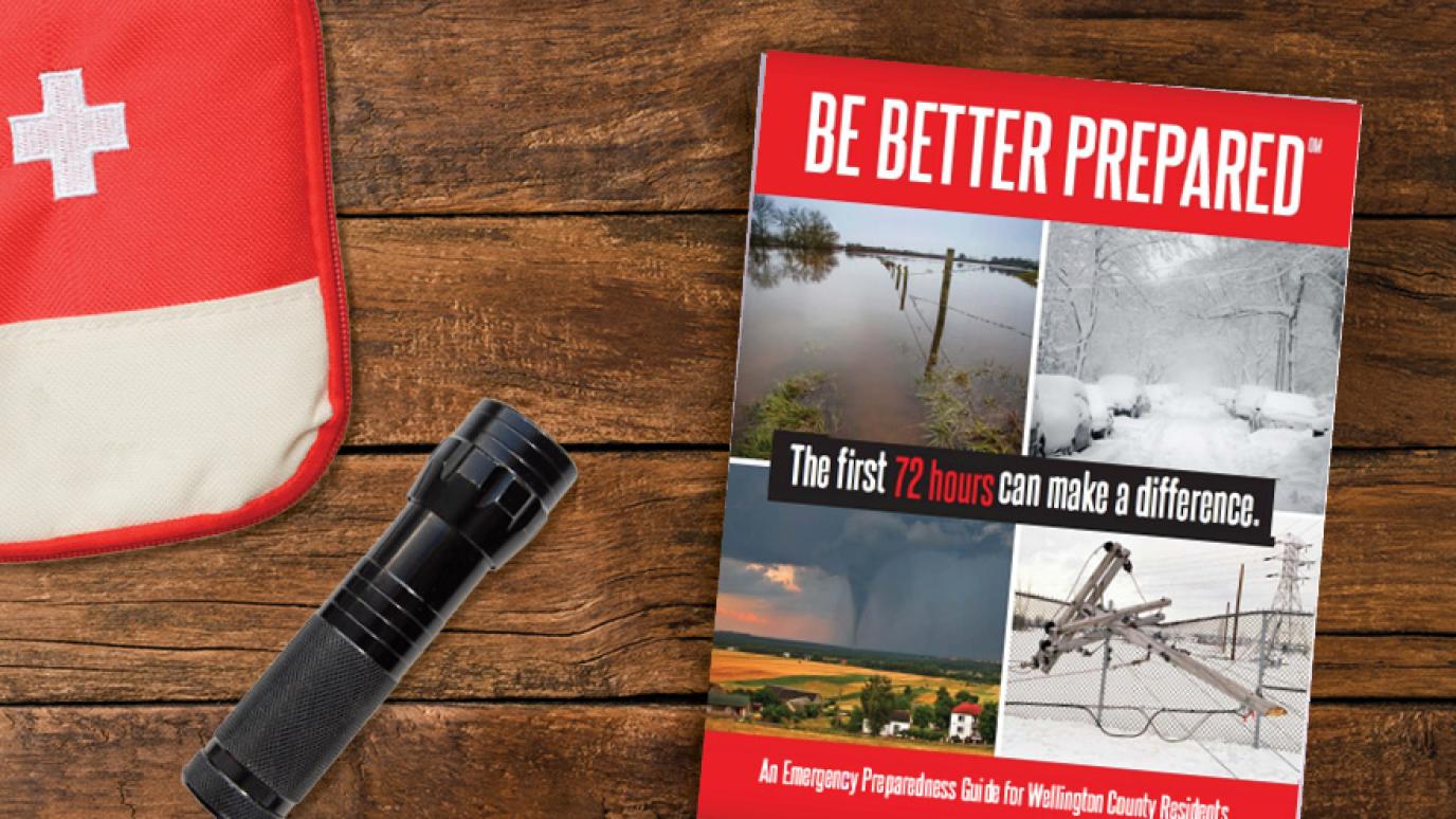 Be Better Prepared book sitting on a table next to a medical kit and flashlight