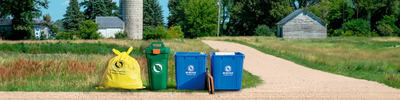 Rural curbside set out of garbage, recycling and green bin