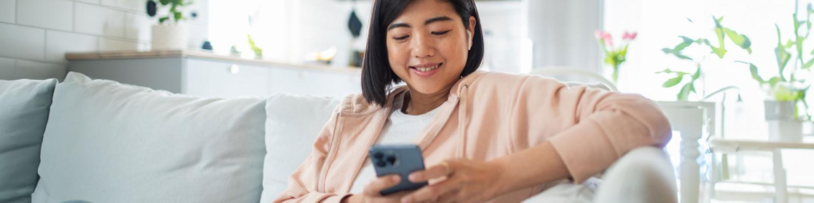 Woman looking at her smartphone
