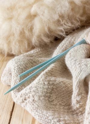 fibre and knitting needles