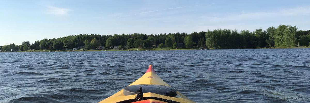 kayak in water looking at shoreline